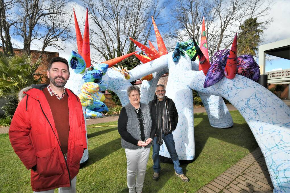 PUBLIC ART: Artists Matthew Aberline and Maurice Goldberg with councillor Jacqui Rudge (centre) and their art installation, titled Adaptation. 
