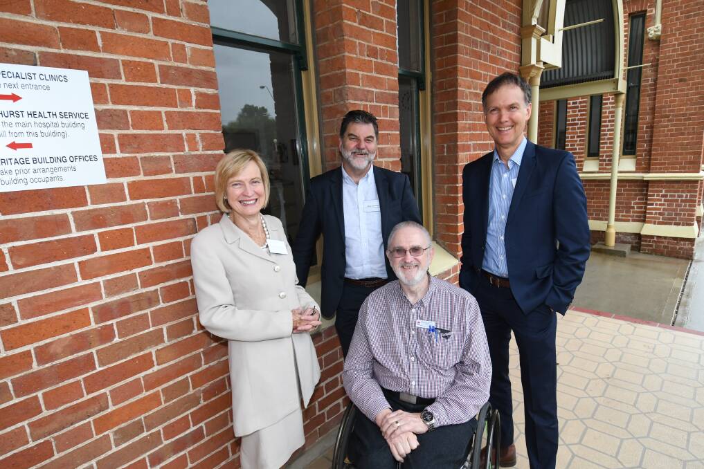 THERE: Director of medical services at Bathurst Base Hospital Dr Geoffrey Westwood, mental health academic Dr Robyn Vines, National Rural Health Alliance's Mark Diamond and National Rural Health Commissioner professor Paul Worley. Photo: CHRIS SEABROOK 121118cvisit1