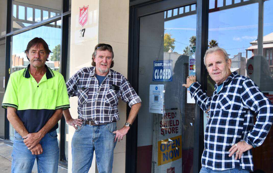 LAST DAY: The Salvation Army Family Store's Gary McKeon, Shamus O'Brien and manager Stephen Barrott on Friday. Photo: RACHEL CHAMBERLAIN