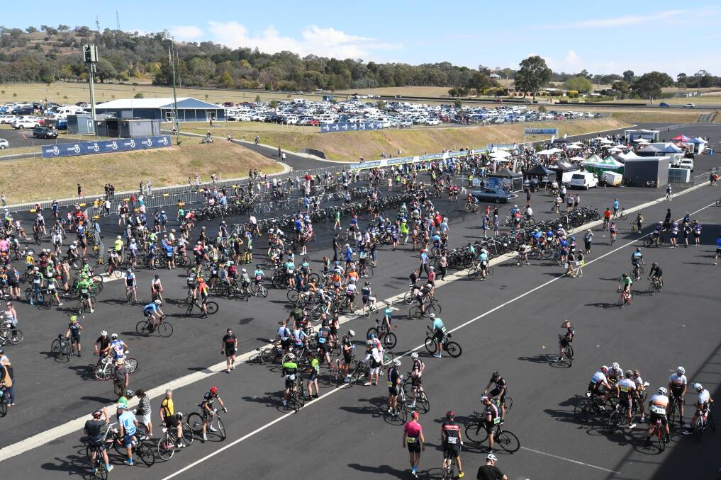HUGE CROWD: The area behind the Mount Panorama pit complex was packed with thousands of tired cyclists, event organisers and volunteers after Sunday's Blayney 2 Bathurst (B2B) race. Photo: CHRIS SEABROOK 042218cb2b12