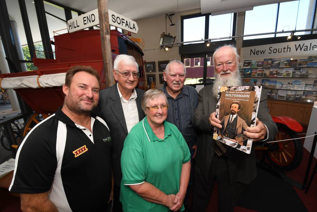 LAUNCH: Family members Matthew Holtermann, John Holterman, Julie Cowen and Bernard Alan with author Malcolm Drinkwater. Photo: CHRIS SEABROOK 022718cnugget