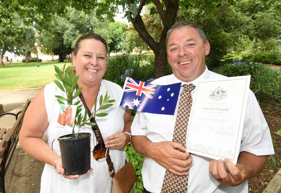 WONDERFUL DAY: Jodie James with her husband Glanmor Terry James, who became a citizen on Australia Day. Photo: CHRIS SEABROOK 012621citz1