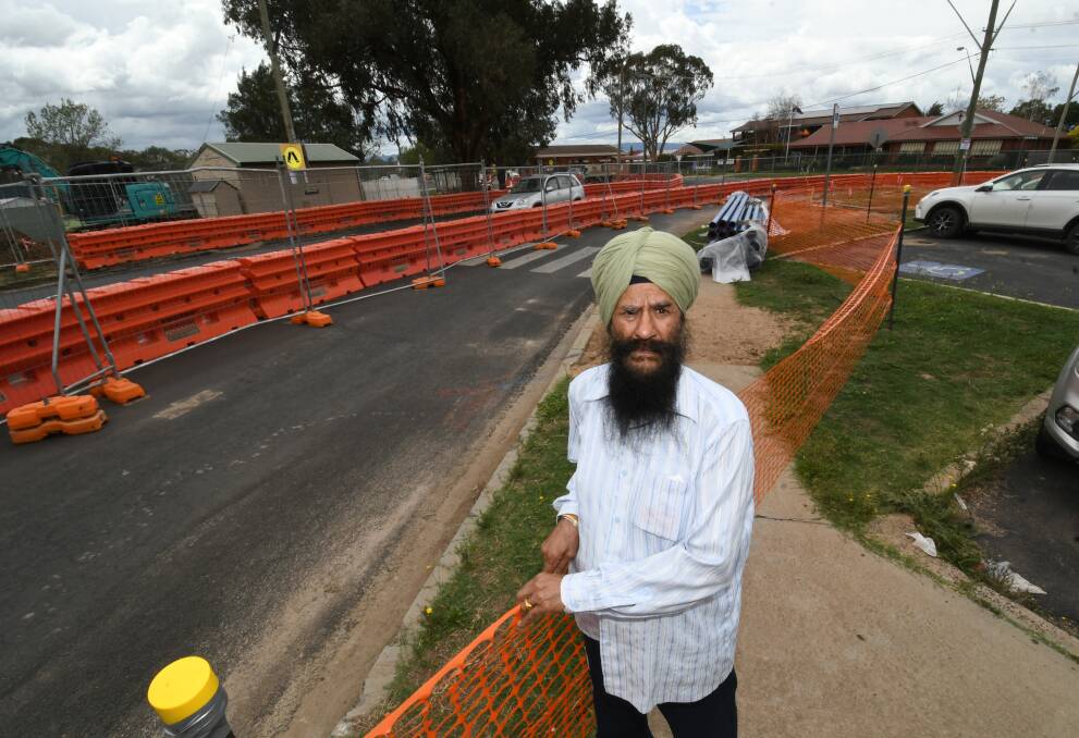 HIT HARD: Lucky 7 Supermarket owner Labh Singh out the front of his store at the intersection of Mitre, Suttor and Lambert streets. Photos: CHRIS SEABROOK 022620crossrds1