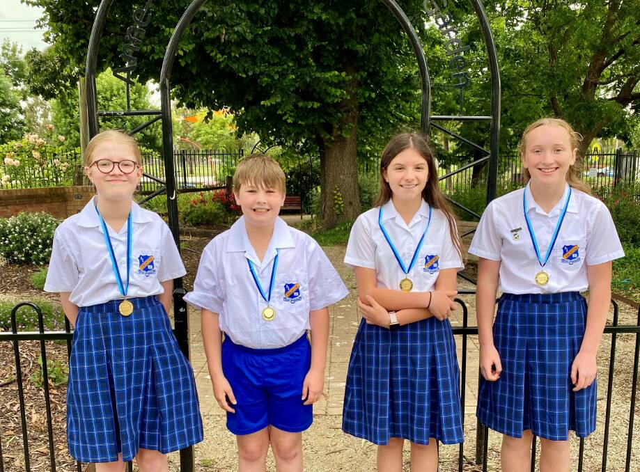 WINNERS: Eglinton Public School students Megan Smuts, Zach Weal, Matilda Steer and Brooke Rankin with their Tournament of the Minds state medallions. Photo: SUPPLIED