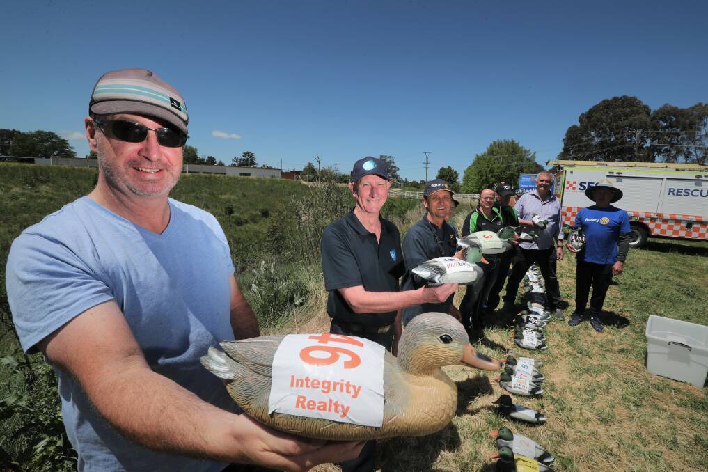 RACE READY: Steve Ellery with other contestants in the Rotary Club of Bathurst's Great Corporate Duck Race. Photo: PHIL BLATCH