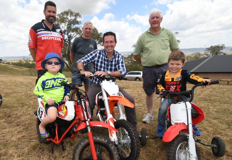 THRILLED: Cameron Beard, Greg Bayliss and Bruce Morgan with local member Paul Toole and kids Flynn Beard, 3, and Logan Ivers, 5. Photo: CHRIS SEABROOK 010919cbikes2