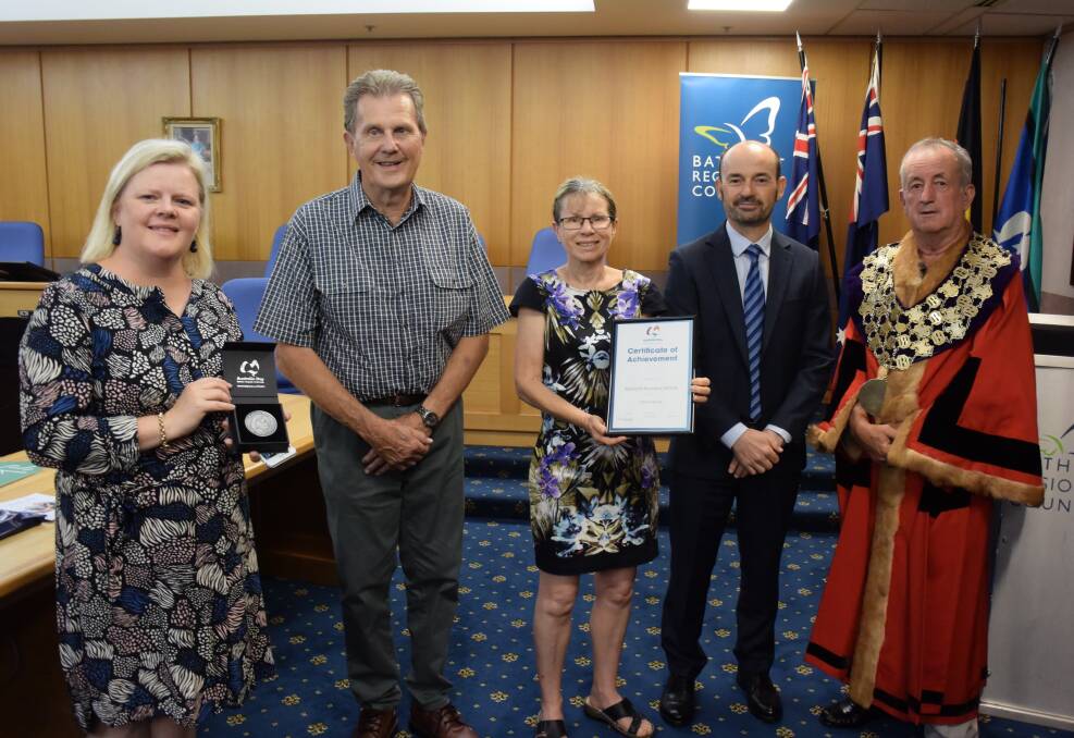 HONOUR: Bathurst Seymour Centre representatives receiving the award from acting general manager Alan Cattermole and mayor Bobby Bourke. 