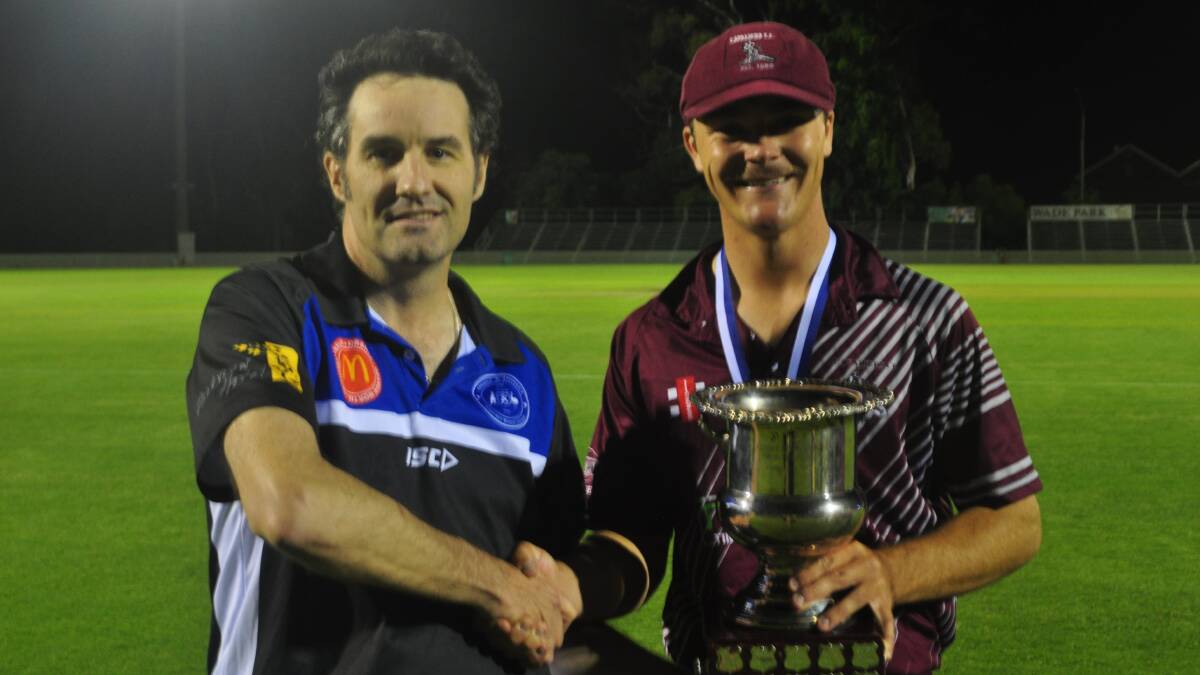 Liam Dillon and Cavaliers captain Bailey Ferguson with the Bonnor Cup. Picture by Lachlan Harper 