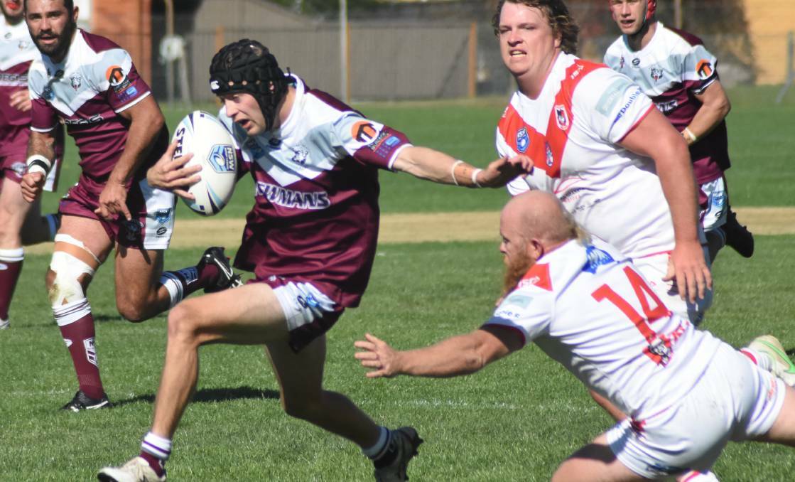 Blayney's Louis Nixon looks to evade Mudgee's defence in round one. Picture by Mark Logan 