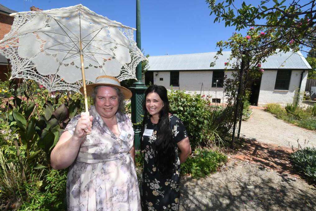 WELCOME BACK: Bathurst District Historical Society volunteers Kim Bagot-Hiller and Sarah Swift were pleased to have visitors back at Old Government Cottage. Photo: CHRIS SEABROOK