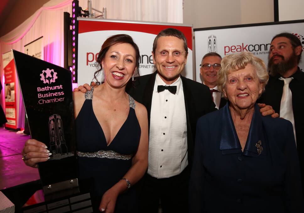 Triple Treat: Tigers legend Wayne Pearce with Debbie Campbell and her mother Ruth Lennon, whom Debbie said was her greatest inspiration. Photo: Phil Blatch.