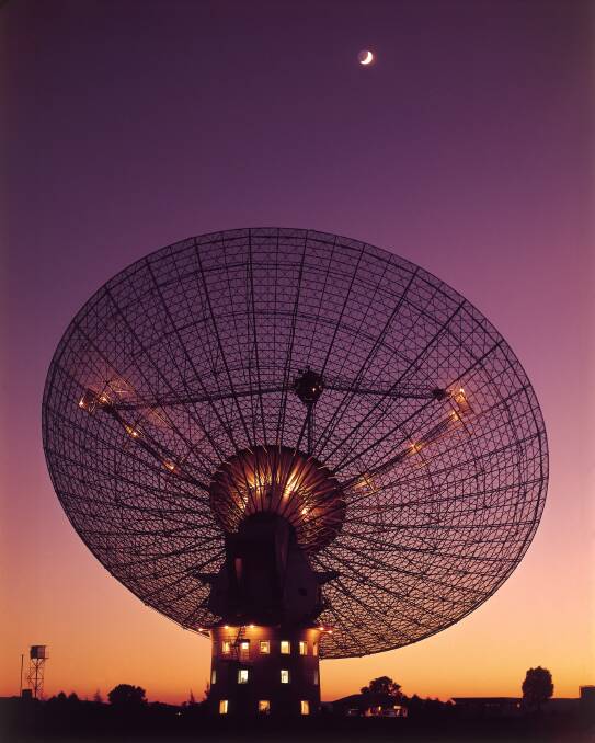 Top tracking: The Parkes Telescope tracking the Moon on 10 July 1969, during a test two weeks before the moonwalk. Photo: CSIRO.