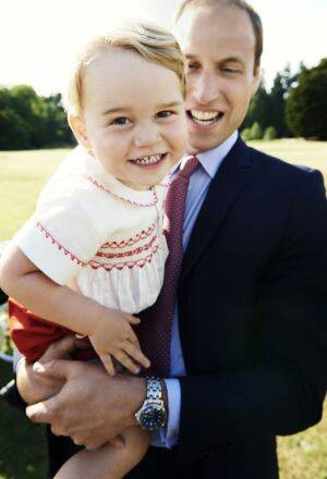 Prince George plays with his father, Prince William, in a 2015 photograph released to mark his second birthday. Photo: Getty Images
