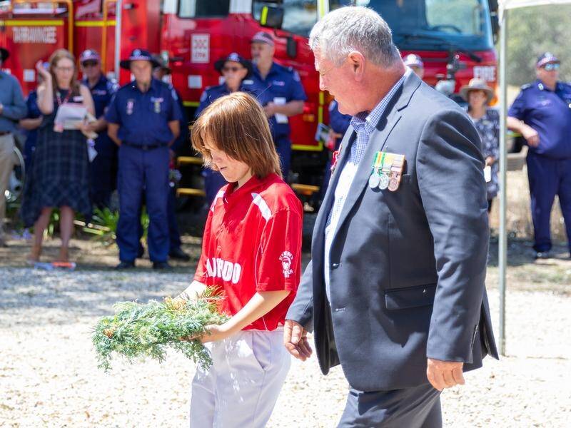 Wreaths have been laid to mark 80 years since the deadly Tarrawingee fire.that claimed 10 lives. (HANDOUT/COUNTRY FIRE AUTHORITY)