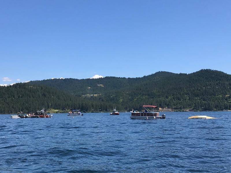 Two small planes have collided in mid-air over a lake in the US state of Idaho, killing eight.