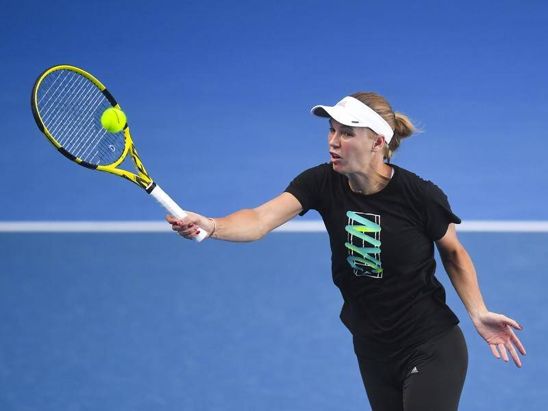 A refreshed Caroline Wozniacki is very relaxed about starting her Australian Open title defence.