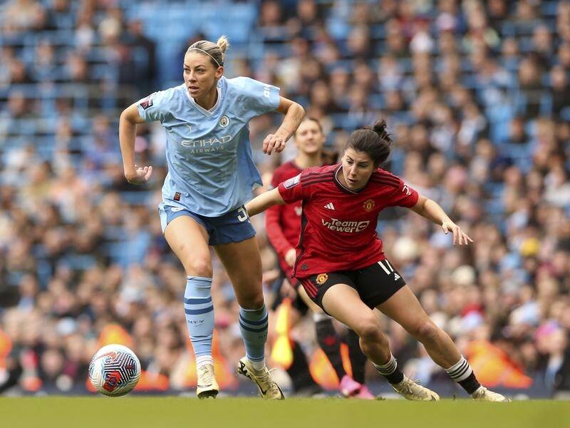 Man City's Alanna Kennedy (L) impressed in their derby win in the Women's Super League. (AP PHOTO)