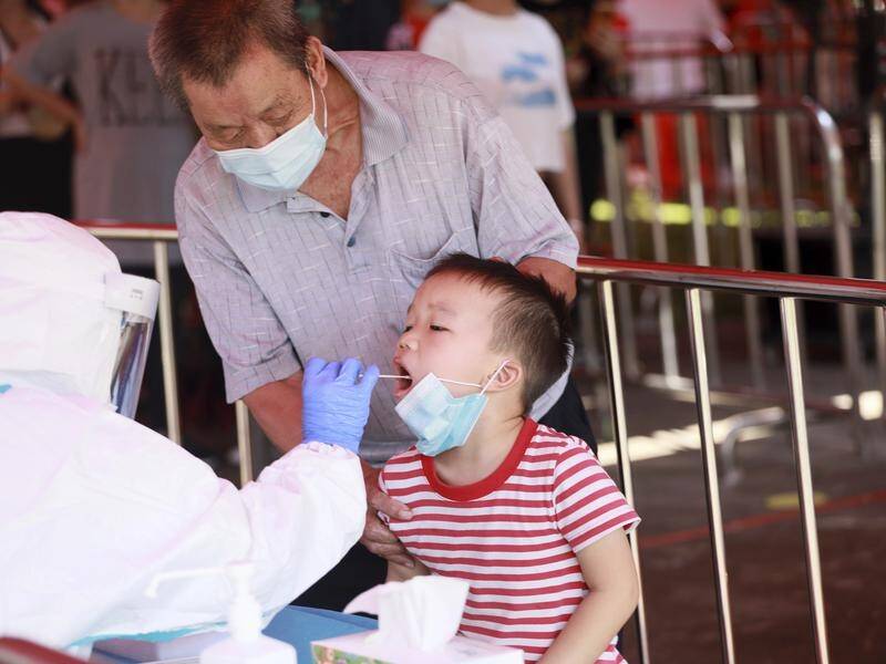 China has reported its highest daily total of COVID cases since January.