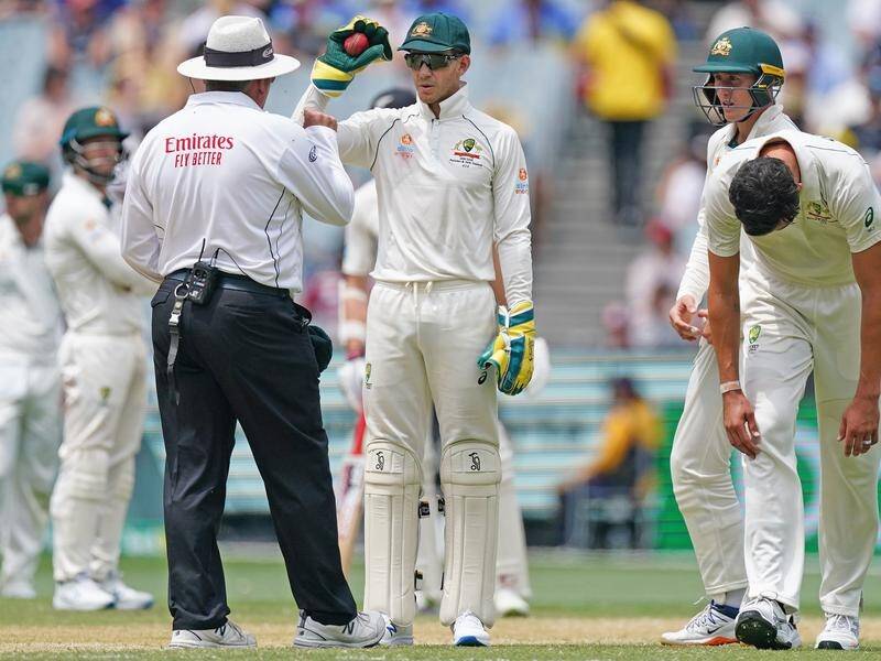 Captain Tim Paine (c) says his poor mood had a negative effect on Mitchell Starc (r) at the SCG.