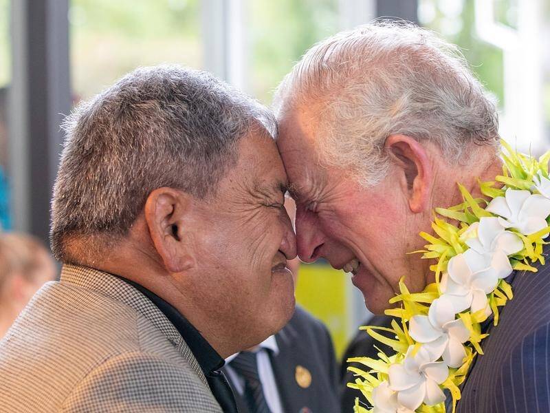 Prince Charles receives a hongi from an elder in Auckland on his royal visit to New Zealand.