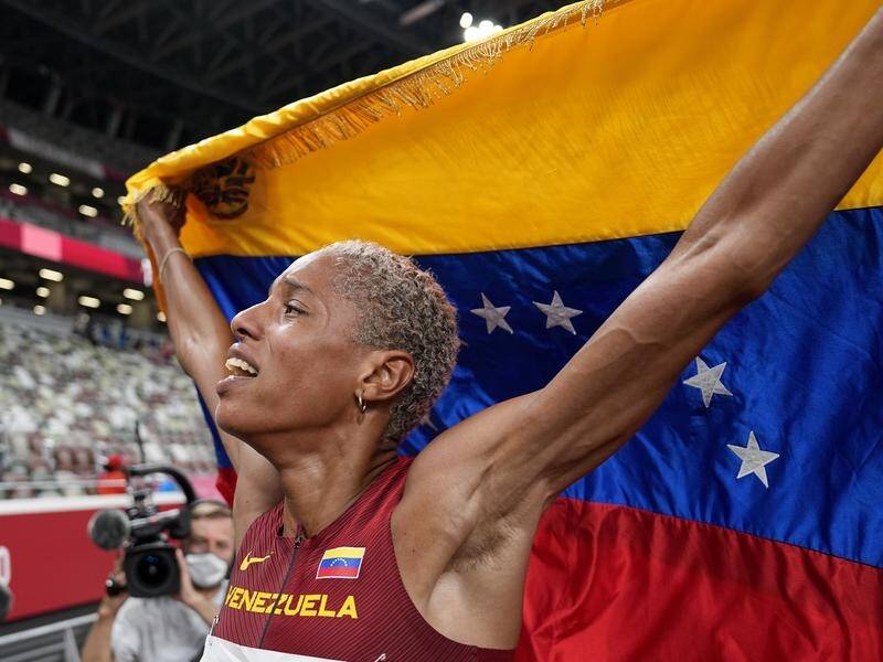 Venezuela's Yulimar Rojas has smashed the world record in winning the women's triple jump in Tokyo.