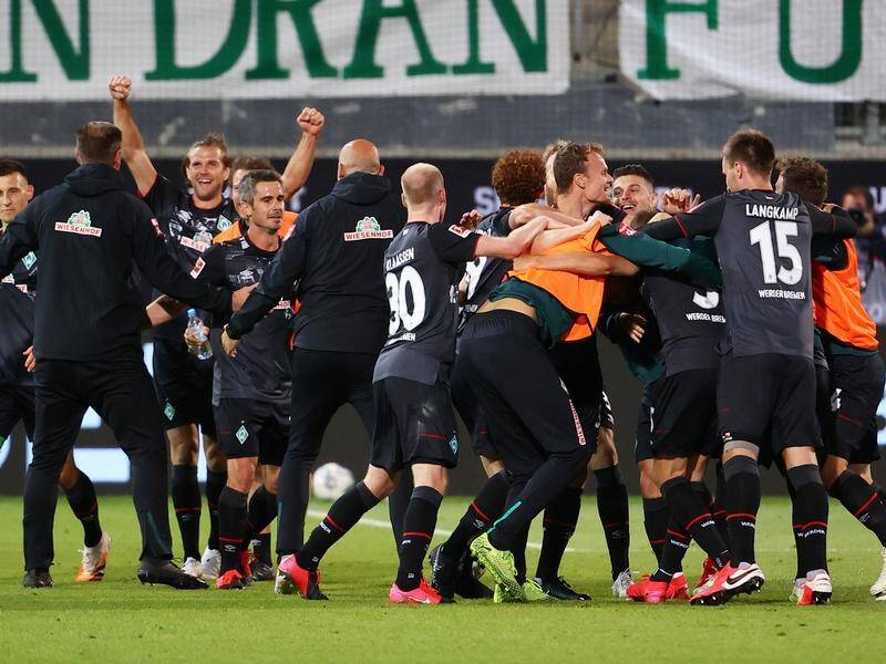 Werder Bremen are staying in the Bundesliga after their playoff win over Heidenheim on away goals.