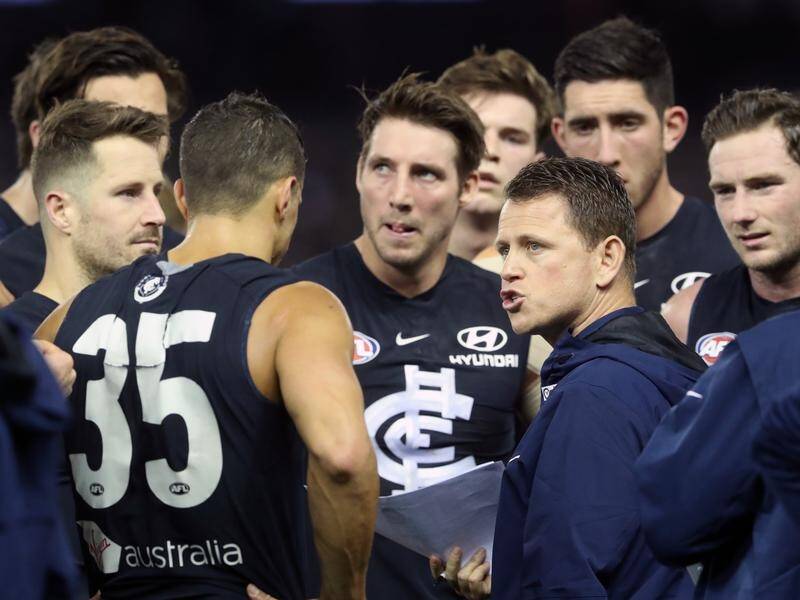 Carlton's Ed Curnow has dismissed a tweet by a former player during their big AFL loss to Fremantle.