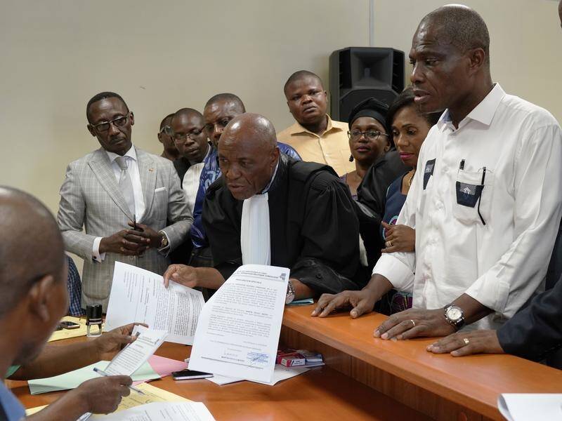 Congo presidential runner-up Martin Fayulu (R) has demanded a recount of votes in recent elections.