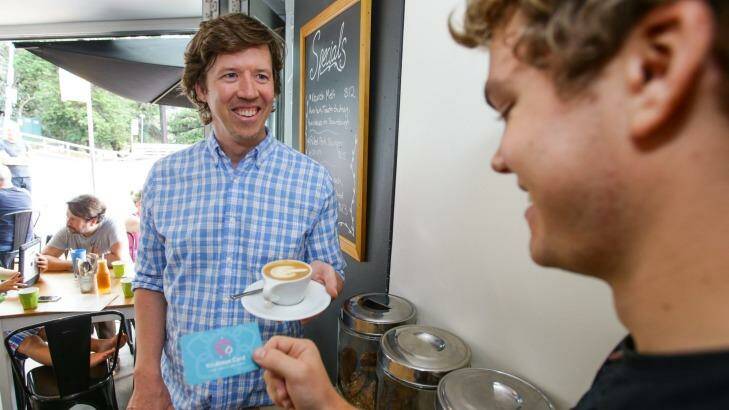 Former Sydney marketing executive Jono Fisher (left) purchased a coffee for a stranger as part of those leading a charge to cultivate compassion in everyday life. Photo: Dallas Kilponned