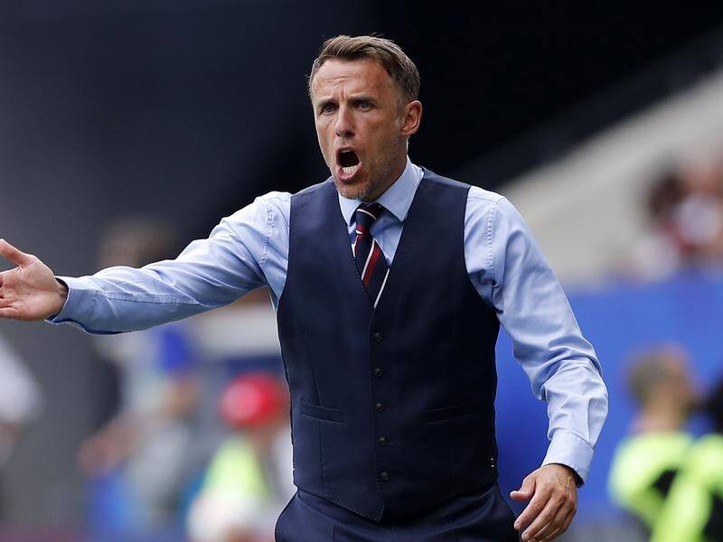 British women's soccer coach Phil Neville is stepping down.