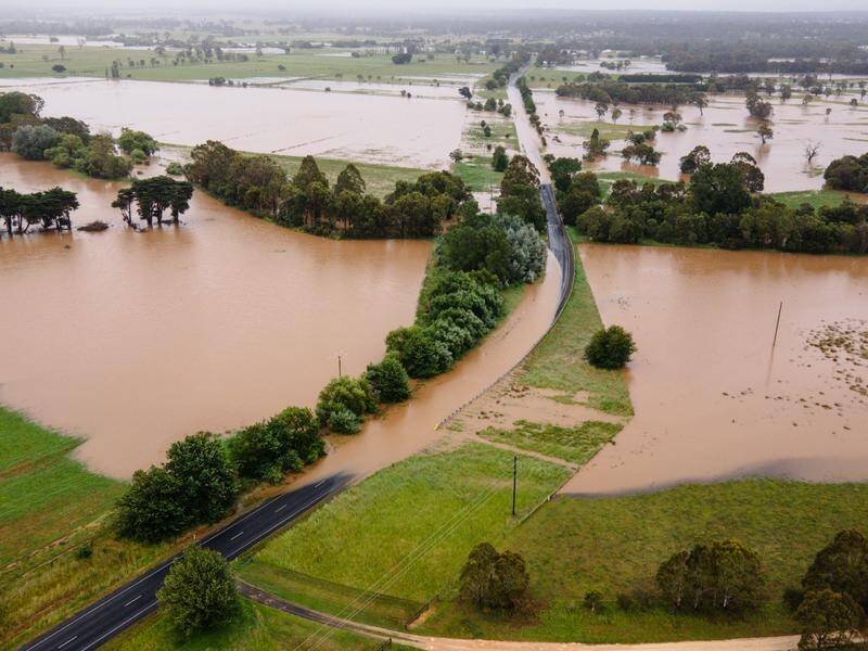 Roads and paddocks have been flooded in a number of areas, including Heyfield in Victoria. (Diego Fedele/AAP PHOTOS)