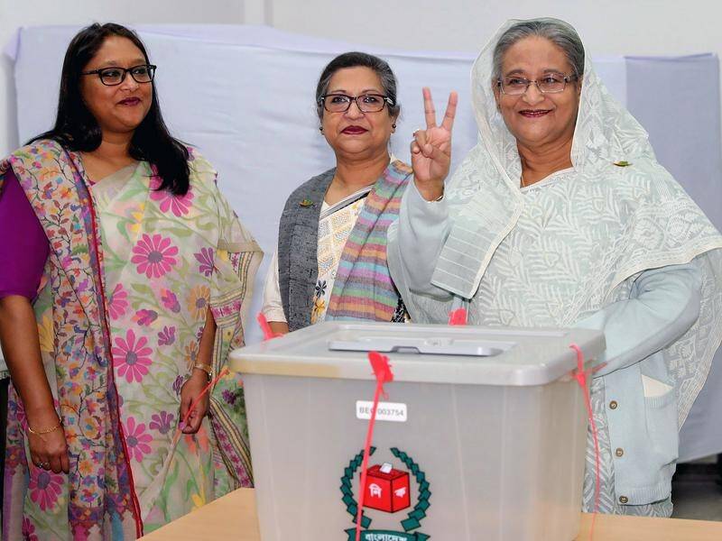 Bangladeshi Prime Minister Sheikh Hasina, right, has won a third straight term in office.