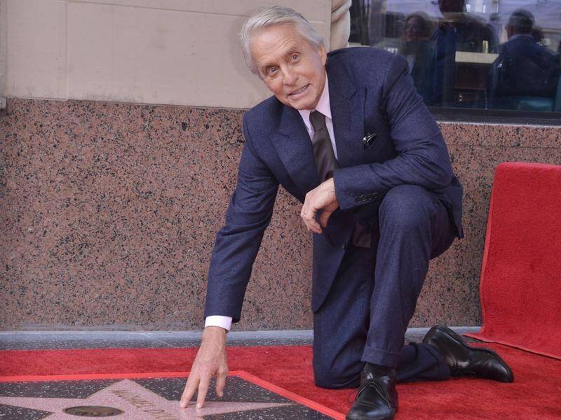 Actor Michael Douglas has been honoured with a star on the Hollywood Walk Of Fame.