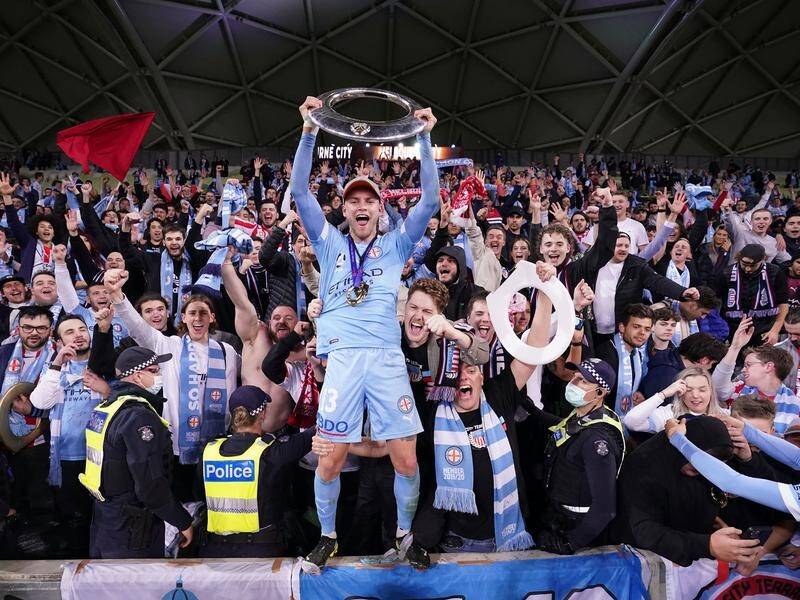 Man of the match Nathaniel Atkinson celebrates Melbourne City's A-League grand final win.