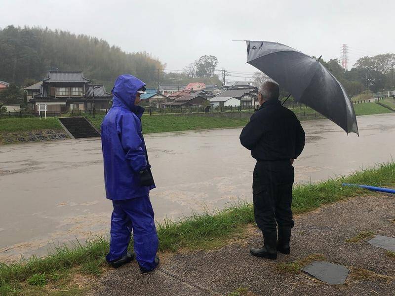 Torrential rain has caused rivers to swell in areas east of Tokyo such as Narita.