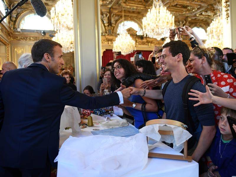 Emmanuel Macron welcomes visitors to the Elysee Palace in Paris to mark European Heritage Days.