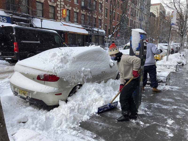 Shovels and snow ploughs are at the ready after a snowstorm hit the northeastern US.
