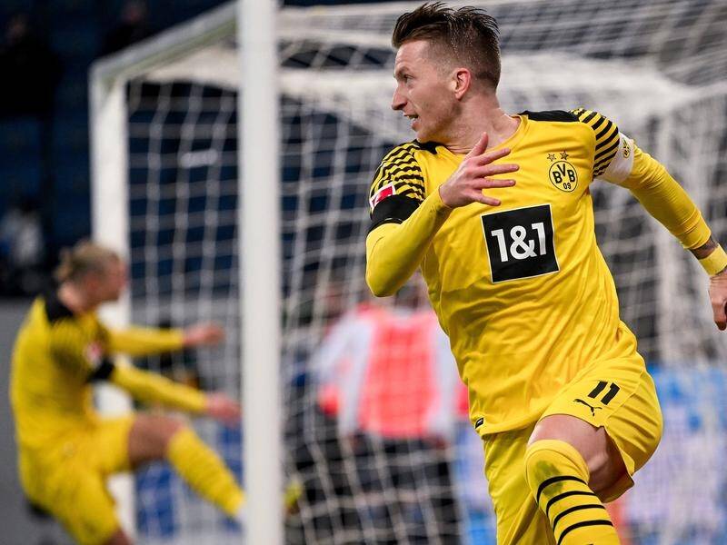 Marco Reus celebrates after putting Dortmund 2-1 up in their important 3-2 victory at Hoffenheim.