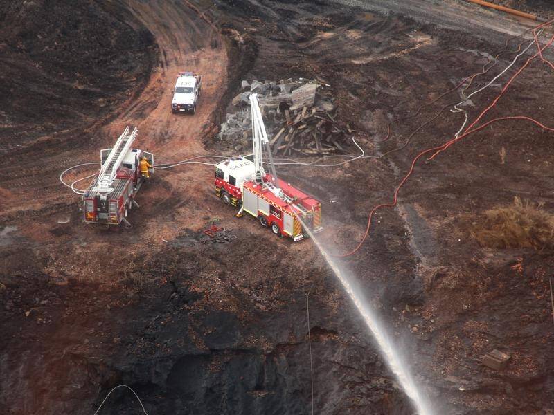 The fire at Hazelwood's open cut coalmine blanketed the nearby town of Morwell with smoke and ash.