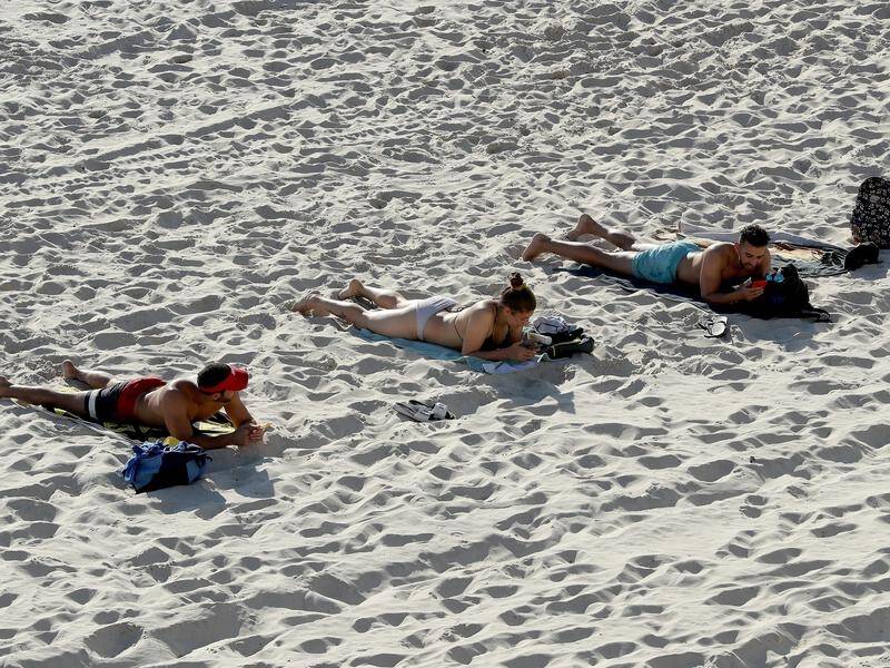 WA has recorded 11 new virus cases even as beachgoers largely adhered to social distancing rules.