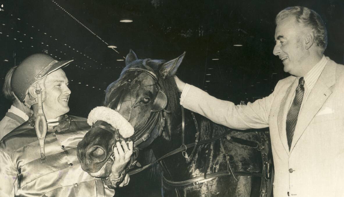 PAIR OF CHAMPIONS: Prime Minister Gough Whitlam (right) congratulates A.D. Turnbull and Hondo Grattan following their win in the 1973 Inter Dominion at Sydney's Harold Park.