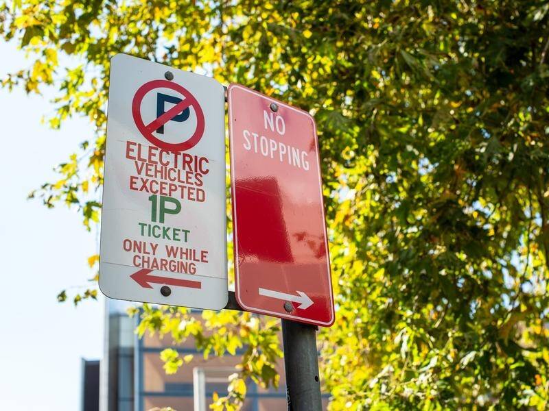 An electric vehicle parking sign is seen in Chatswood, Sydney. (Jennifer Dudley-Nicholson/AAP PHOTOS)