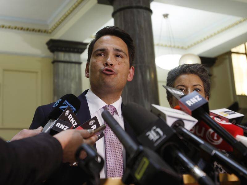 The NZ opposition, led by Simon Bridges (c), denies hacking Treasury for budget documents.