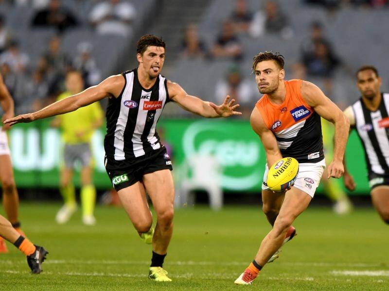Stephen Coniglio (right) is using the pain of missing much of last year to fire his 2018 GWS season.