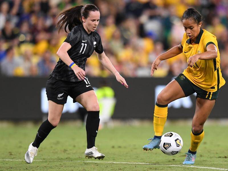 Young Matildas gun Mary Fowler (r) has signed a four-year contract with UK giants Manchester City.