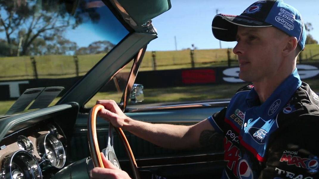 GREAT VIEW: Mark Winterbottom takes a 1968 Ford Mustang for a lap around Mount Panorama.