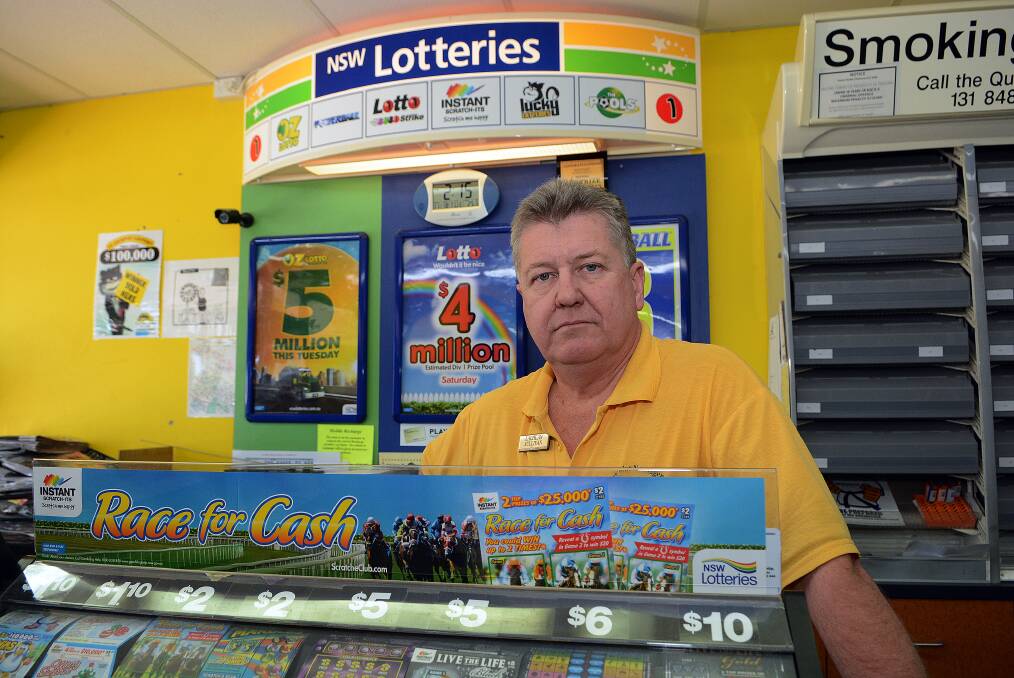 SMALL BUSINESS: Newsagency owner Lachlan Sullivan wants the government to stand up against Tatts Lotto to ensure newsagents remain the only providers of lottery tickets and scratchies. Photo: PHILL MURRAY 111814plach