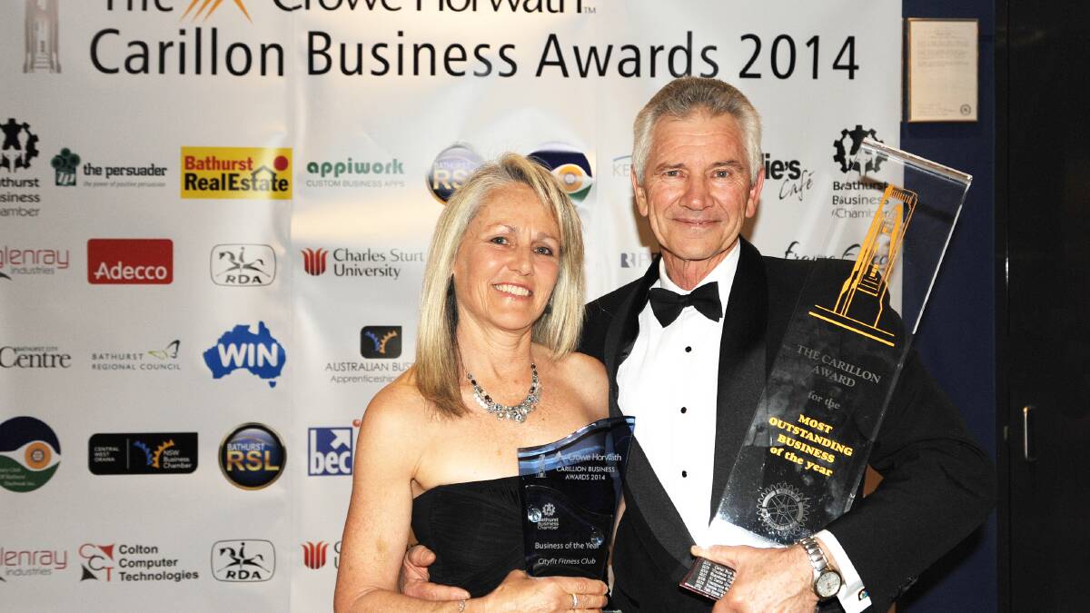 OUTSTANDING: Margot and Gary Webster from Cityfit accept the Carillon Award for the Most Outstanding Business of 2014 during the Crowe Horwath Carillon Business Awards dinner on Friday night. Photo: CLARE LEWIS	 091914bawinner