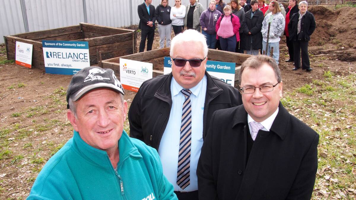 TEAM WORK: Councillor Bobby Bourke with Reliance Credit Union’s Mark Haley and Verto’s Ron Maxwell at the site of the city’s new community garden. Photo: ZENIO LAPKA	 072414zgarden