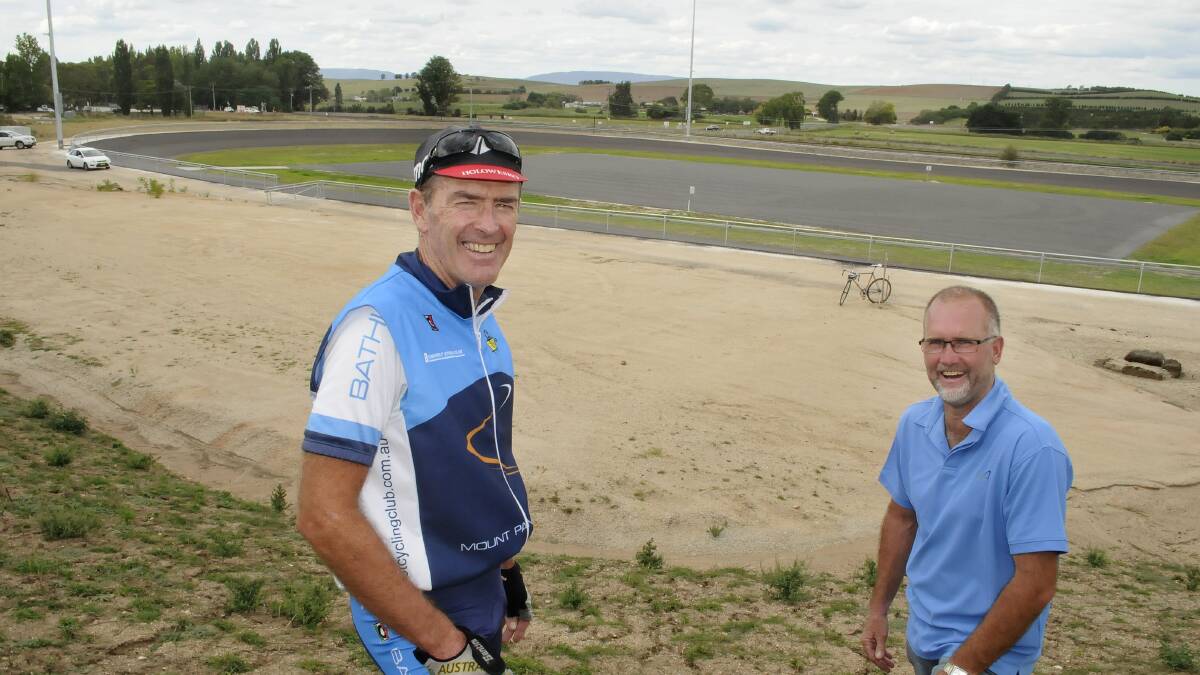 BIKE PARK: Bathurst Bike Park Steering Committee chairman Mark Windsor and Councillor Ian North looking over the new velodrome at the Vale Road bike park. Photo: CHRIS SEABROOK 	022614cvelo1
